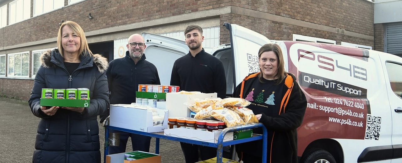 Richard, Kerry and George Hooper unloading food donations at the Halo Centre in Binley