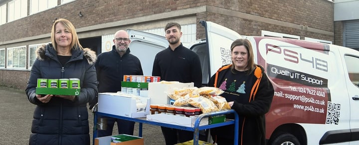 Richard, Kerry and George Hooper unloading food donations at the Halo Centre in Binley